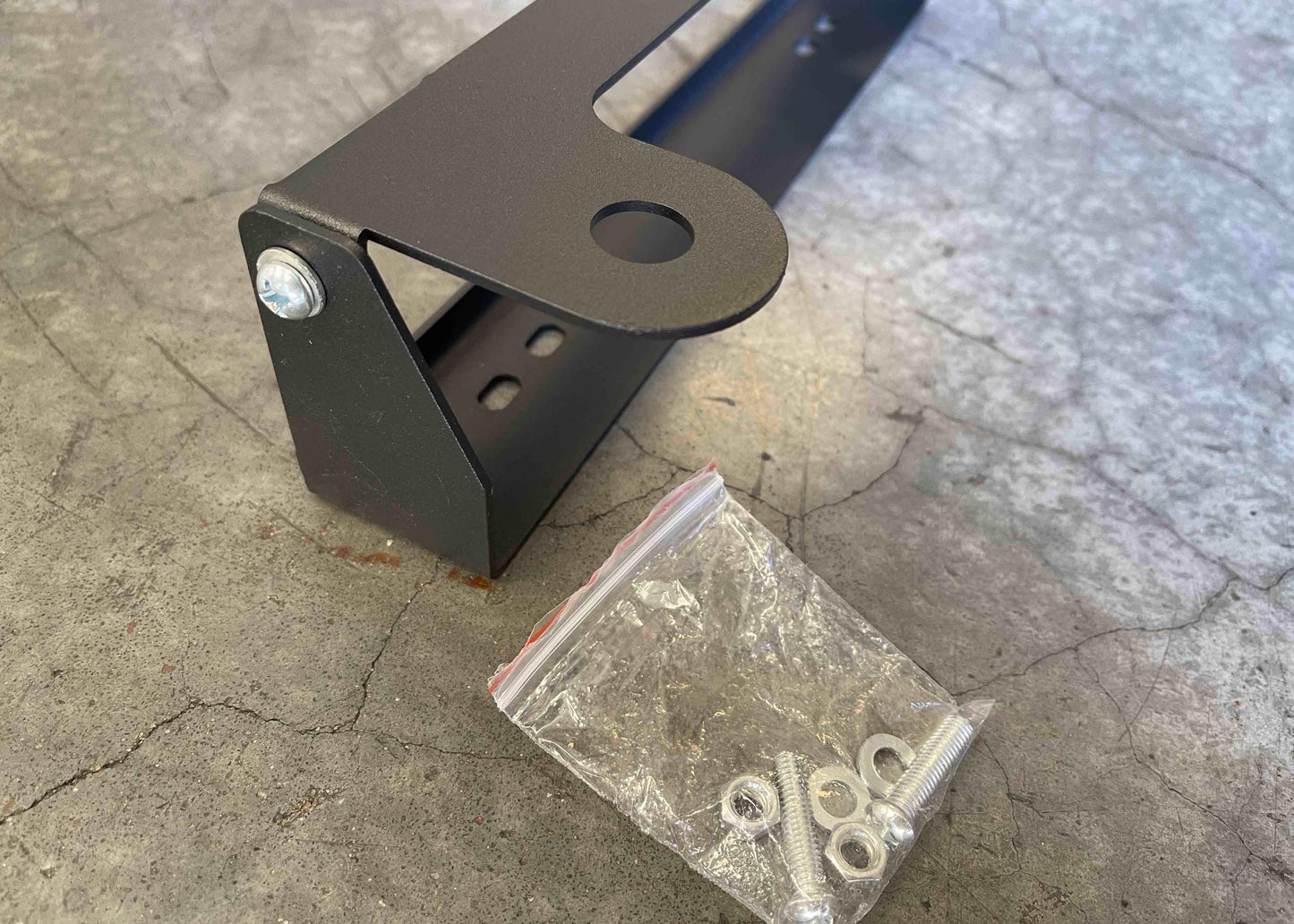 Flip Up Front License Plate Holder - Hawse Fairlead Backwoods Adventure Mods