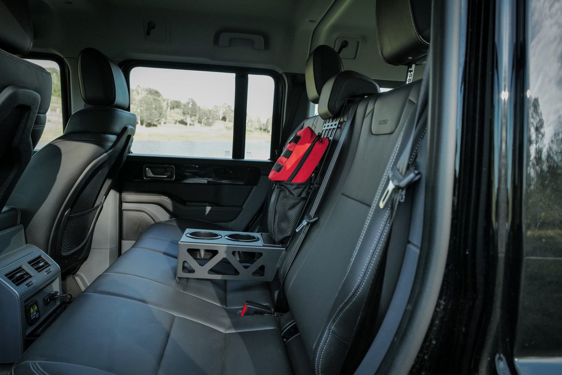 INEOS Grenadier Rear Seat Cup Holder + Storage Tray & MOLLE Panel Canyon Adventure Vans